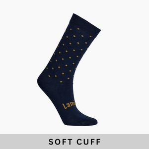 Merino Wool Soft Cuff Crew Socks for Women in navy with yellow dots and soft cuff feature.