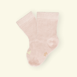 Soft blush Organic Cotton Baby Socks with a cozy ribbed design, perfect for tiny feet.