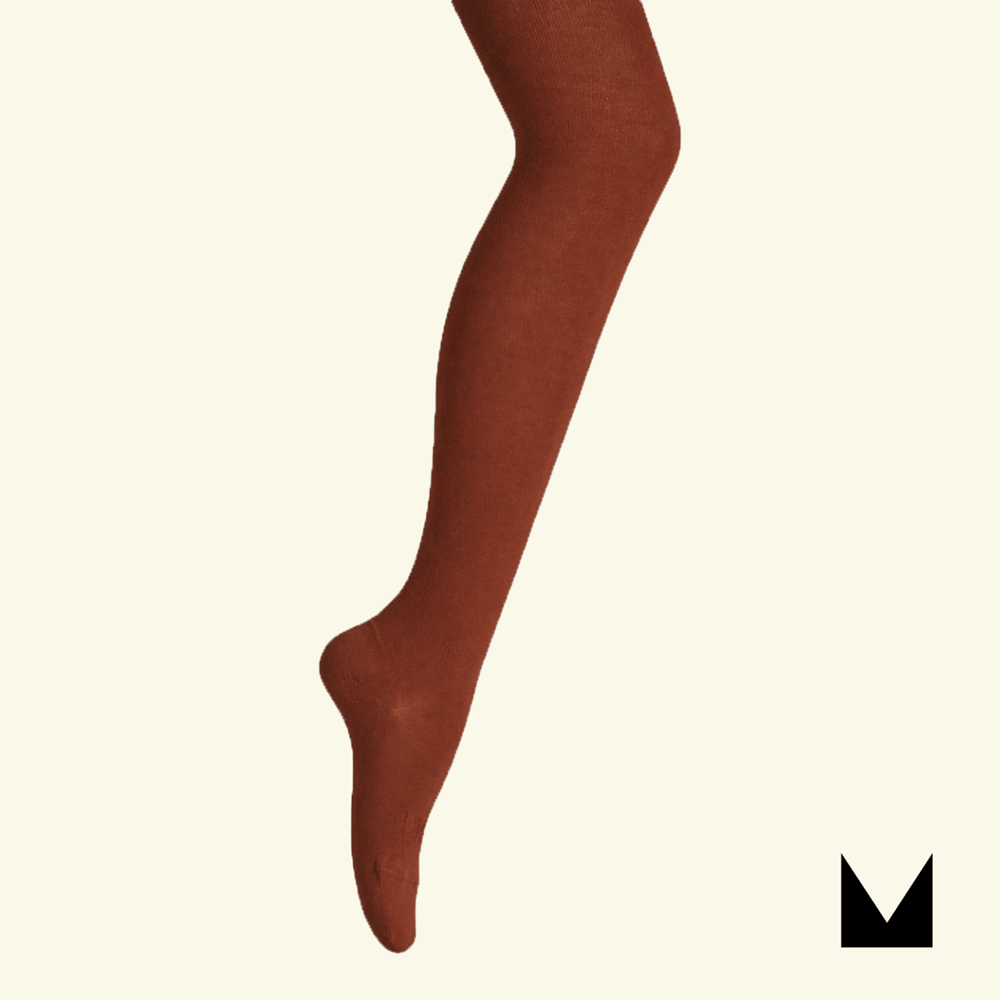 Organic Cotton Flat Knit Tights in Brick color, showcasing a woman's leg in a natural pose.