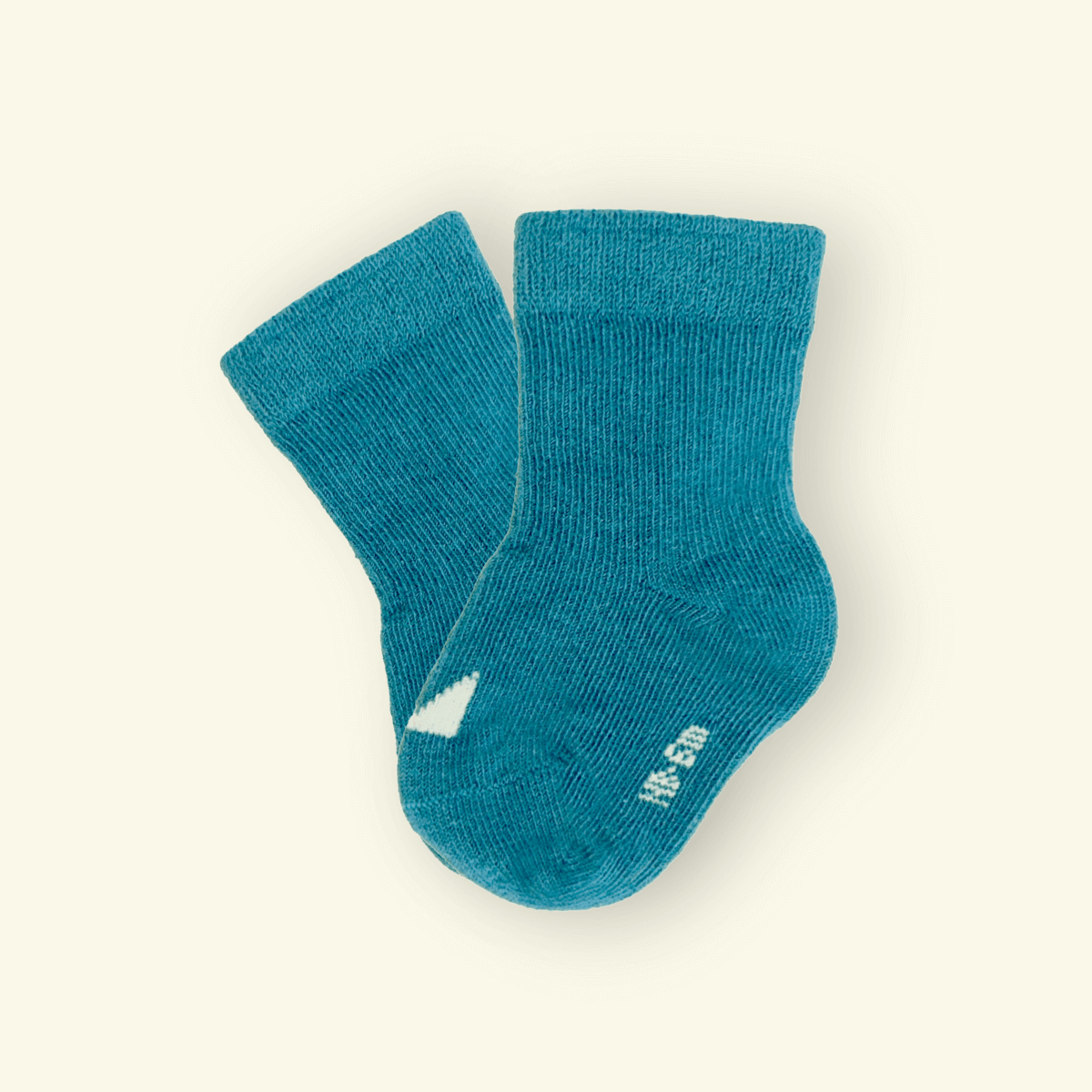 Organic Cotton Baby Socks in teal blue by Mosey, soft and snug for little adventures.