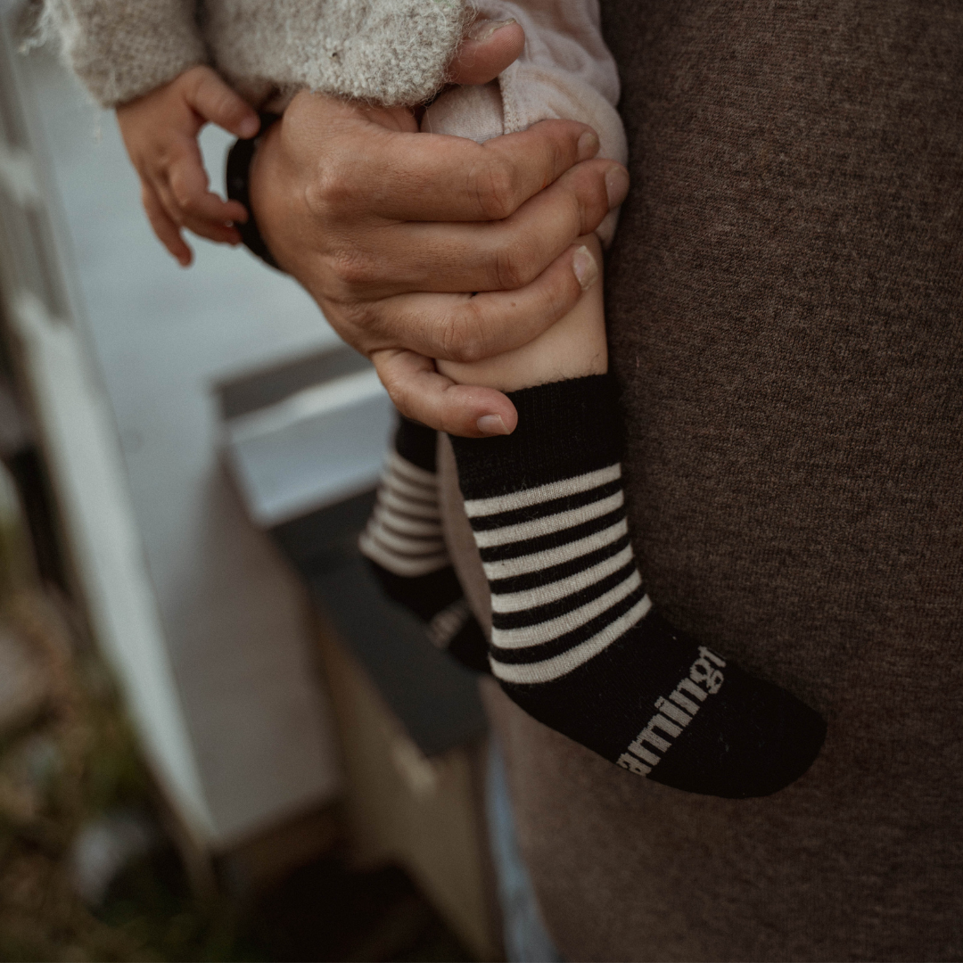 Merino Wool Crew Socks for Baby - West with black and latte horizontal stripes, perfect for keeping little feet warm.