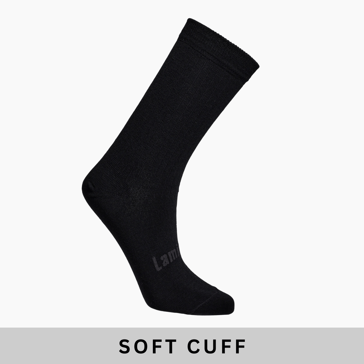 Merino Wool Soft Cuff Crew Socks in black rib shown on a side view with soft cuff design.