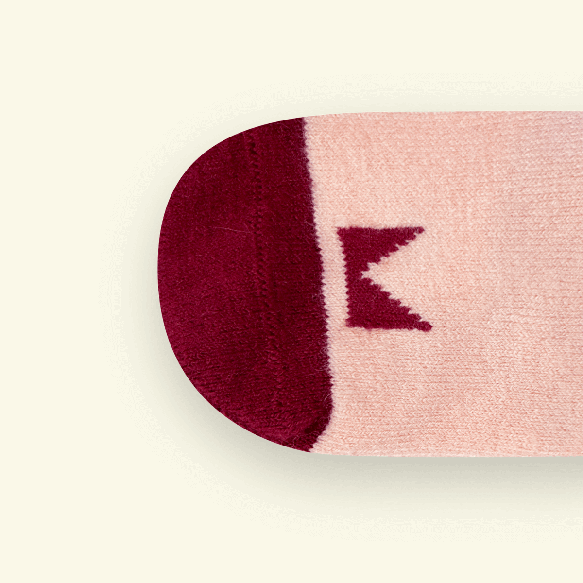 Close-up of the toe design of Merino Wool Baby Socks in Plum, showcasing its cozy texture and signature pattern.